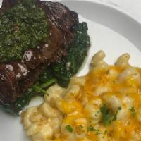 Marinated Skirt Steak & Pimento Mac And Cheese · grilled asparagus and chimichurri sauce. Cooked to your liking.
                            ...