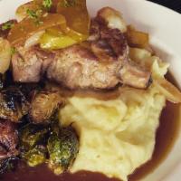 Pork Chop · Pan roasted bone in pork chop, roasted brussel sprouts,
caramelized granny smith apples and ...