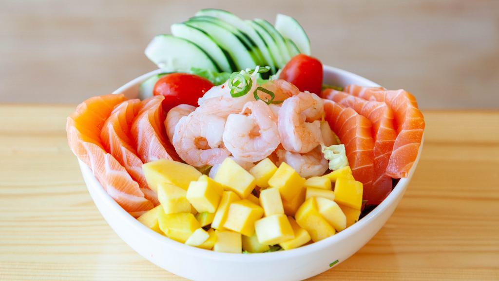 Yuzu Salmon · Salmon, shrimp, spicy salmon, cucumber,
Edamame, red onion,scallion,mix with Yuzu sauce, top with corn tomatoes ,pickled, carrots, mango , rice pearl and sesame.