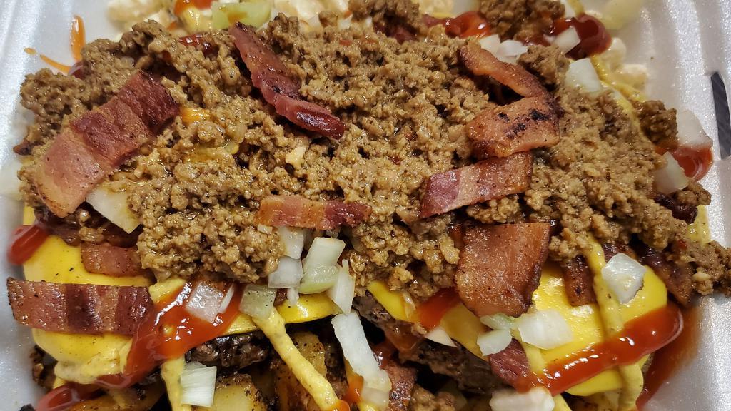 Bacon Cheeseburger Plate · 2  Cheeseburgers (1/5 lb)  served over Mac Salad & Home Fries.  Smothered with Meat Hot Sauce (mild to medium heat), and topped with Bacon. ketchup, mustard and diced onions.