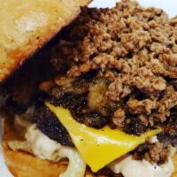 Station Burger · A single Cheeseburger (1/5 lb) with a hash brown, Mac Salad, Meat Hot Sauce and Station Sauc...