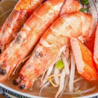 Phở Hải Sản Noodle Soup · House special Vietnamese Pho, served with rice noodles, shrimps, squids, crab meat,  onion, ...