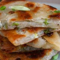 Scallion Pancakes · Served with house-made sweet mayo and soy dumpling sauce.