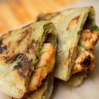 Scallion Pancakes Wrap · Scallion pancake served with all natural seared chicken with soy dumpling sauce.