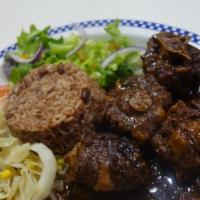 Oxtail · Trimmed and sliced chunks of oxtail seasoned freely with fresh spices and simmered to tender...
