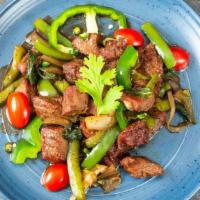 Black Pepper Beef · Grass fed steak marinade in fresh black pepper, white onion, bell pepper sauteed to perfecti...