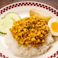 Organic Coconut Lemongrass Chicken Rice Bowl (Spicy) · Served with salad, spring roll and organic hard boiled egg.