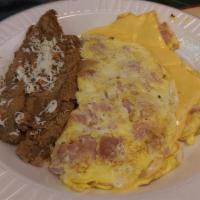 Cheese Omelette · Yellow American or white American. Served with beans and rice or home fries.