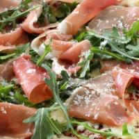 Prosciutto Arugula · Our classic White pizza topped with thinly sliced prosciutto, shaved cheese blend and fresh ...