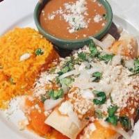House  · Three flour tortillas topped with Monterey Jack and ranchero sauce served with Spanish rice,...