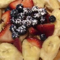 Tutti-Fruitti Waffle · QWith bananas, strawberries, apples and raisins.
