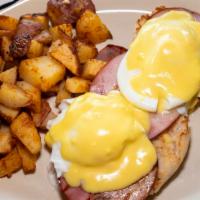 Classic Benedict · Two poached eggs, Canadian bacon, hollandaise, english muffin.