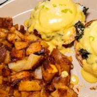Eggs Florentine · Two poached eggs, spinach, hollandaise, english muffin.