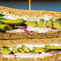 Avocado Toast · Seasoned avocado spread, multigrain toast, garlic yogurt, and sliced radish.