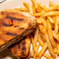 Main Street Panini · Grilled chicken, roasted red peppers, fresh mozzarella, and pesto.