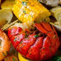 Yummy Lobster Pot · One 6oz coldwater Brazilian lobster tail with one pound mixed cajun shrimp, clams, and musse...