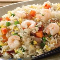Traditional Fried Rice · Wok stir fried with eggs, onion, peas and carrots.