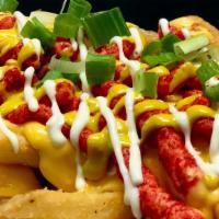 Hot Mess Fries · Our fries overloaded with Cheesy Sauce, Smoked-Out Aioli, Spicy Mayo, Bacon Crumbles, Hot Ch...