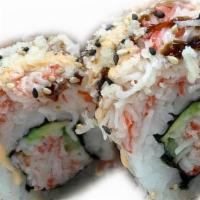 The Super California Roll · California roll with mango and topped with extra kanikama.
