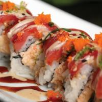 Spicy Fusion Roll · Cajun tuna and tobiko with spicy salmon and tempura crunch.