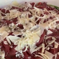 Bresaola · Salt Cured Beef, Arugula, Heirloom Cherry Tomatoes, Grana, Raspberry Vinaigrette