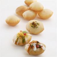 Dahi Puri · Crispy sphere-shaped balls stuffed with diced boiled potatoes and sprouted black gram, garni...