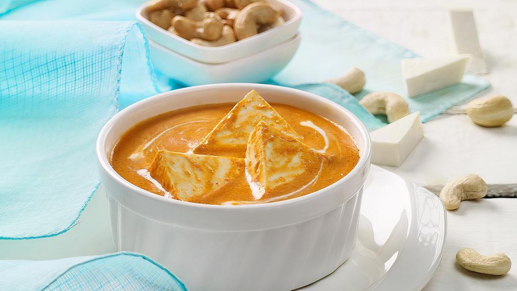 Shahi Paneer · Amalgamation of onion, almonda, cashew nut, resulting into a creamy aromatic and sweet gravy with soft Cottage cheese cube. Come with Rice