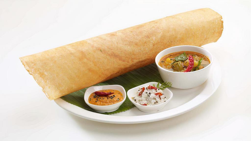 Plain Dosa · Thin pancake made from a fermented batter. It is similar to a crepe made of rice and black gram lentils.