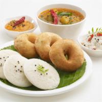 Idli Sambhar (2 Pcs.) · The cakes are made by steaming a batter consisting of fermented black lentils (de-husked) an...