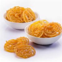 Jalebi · An Indian sweet made of a coil of batter fried and steeped in syrup.