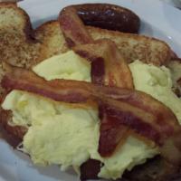Lumberjack French Toast · With bacon, ham, sausage and two eggs any style.