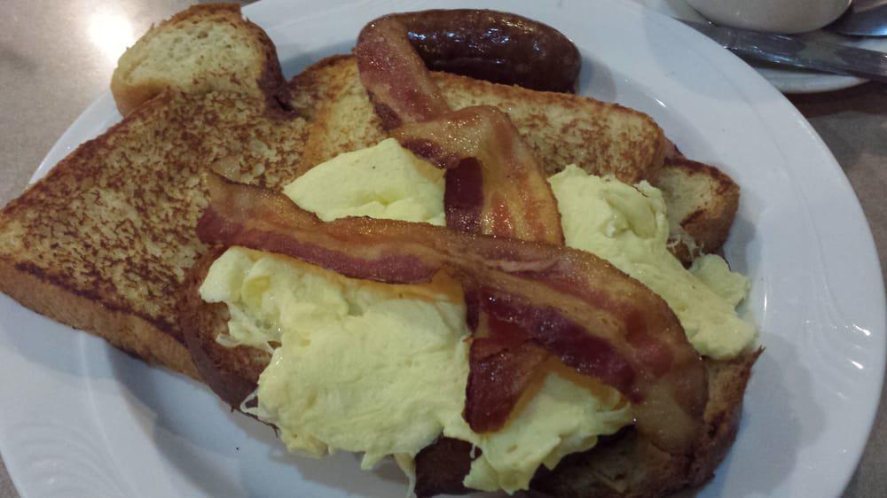 Lumberjack French Toast · With bacon, ham, sausage and two eggs any style.