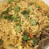 Pineapple Fried Rice · Cashew nut, curry powder, egg, garlic, onion, pineapple, scallion, bean and carrot.
