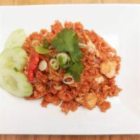 Basil Fried Rice · Thai Mulitigrain Rice sautéed with chili garlic red peppers , onion, scallions and basil.