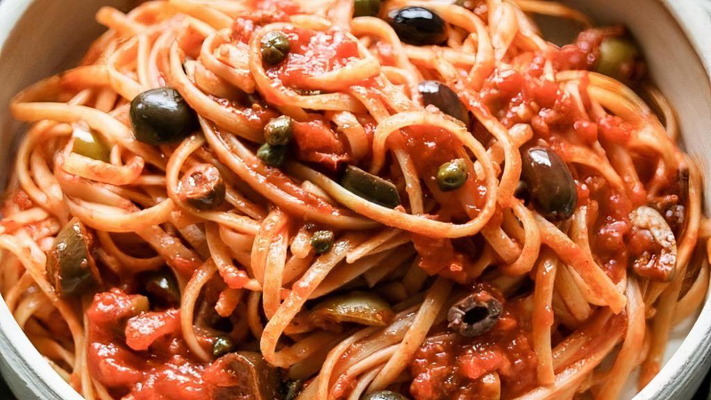 Linguine Puttanesca · Marinara sauce, anchovies, capers, and olives served with linguine pasta