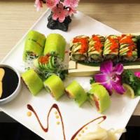 Dragon Roll · Crab, cucumber, avocado, topped with eel , avocado and eel sauce.