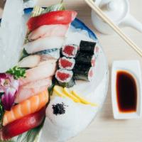 Sushi Dinner · Nine piece sushi and tuna roll.