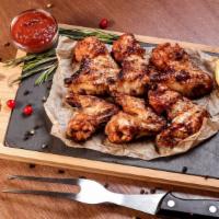 Honey Bbq Wings - Bone-In · Delicious bone-in chicken wings fried and tossed in Honey BBQ sauce, and cooked to a perfect...