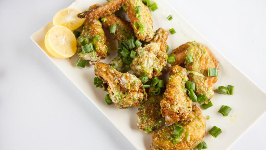 Garlic Parmesan Wings - Bone-In · Delicious bone-in chicken wings fried and tossed in Garlic Parmesan sauce, and cooked to a perfect crisp.