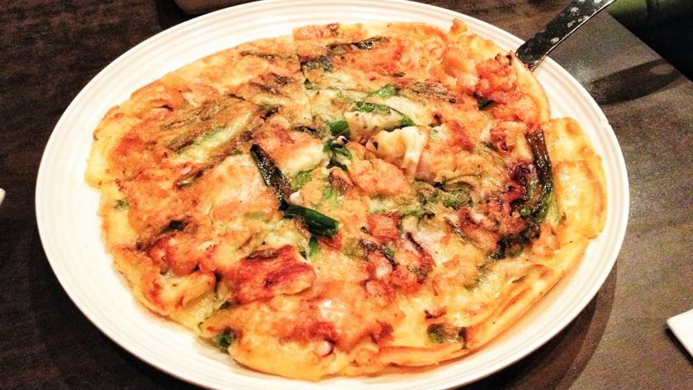 Seafood Pajeon · Traditional Korean pancake with mixed seafood & scallions