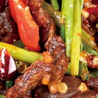 Dry Sautéed Beef With Long Hot Pepper · Hot and spicy.