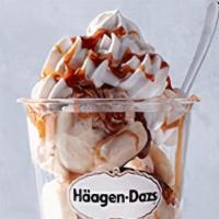 Dulce De Leche Dazzler® Sundae · Dulce de leche ice cream layered with bananas and warm caramel topped with whipped cream and...