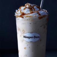 Dulce De Leche Milkshake · Sweet caramel ice cream blended and topped with whipped cream and warm caramel.