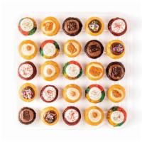 The Oh My Gluten Free Cupcakes · All the sweet without the wheat. Your favorite bite-size cupcakes, made gluten free. Tie dye...