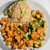 Hibachi Chicken Dinner · Two shrimps appetizer, fried rice, grilled vegetables, and salad.