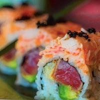 Spicy Girl Roll · Black Peppered Tuna, avocado and crunchy inside, topped with spicy kani salad. Drizzled with...