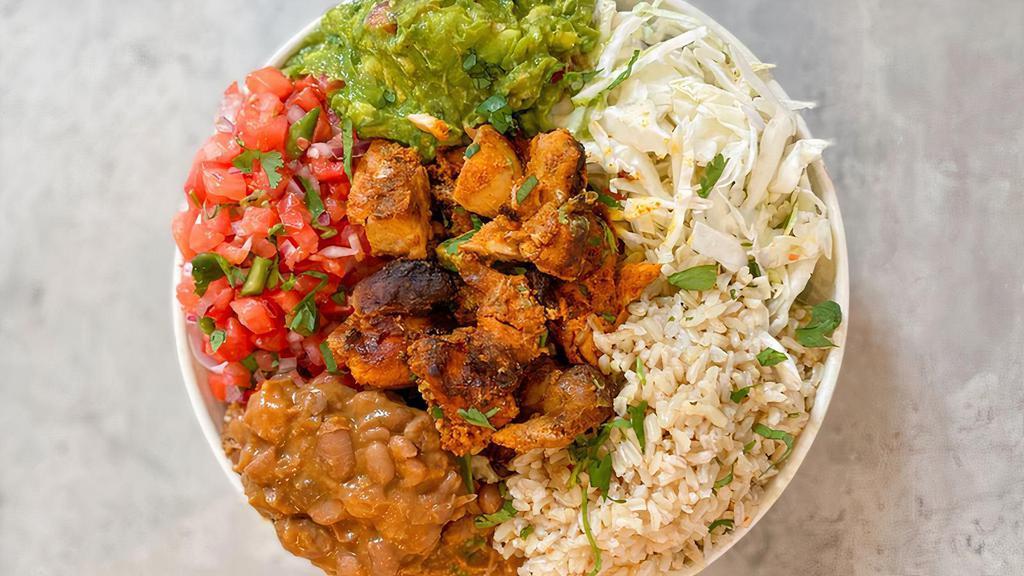 Chili Lime Chicken Bowl · Oven roasted, chili lime chicken thigh with your choice of toppings and sauce.