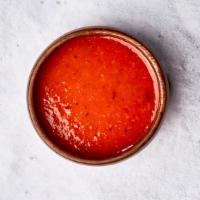 Habanero Hot Sauce · House-made hot sauce with spicy habaneros.