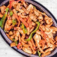 Pollo Salteado · Sautéed chicken strips with sweet onions and mix bell peppers.