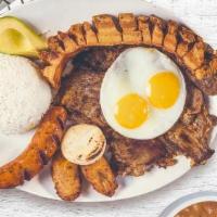 Bandeja Paisa · Typical Colombian dish of steak, pork crackling, chorizo, eggs, rice and beans